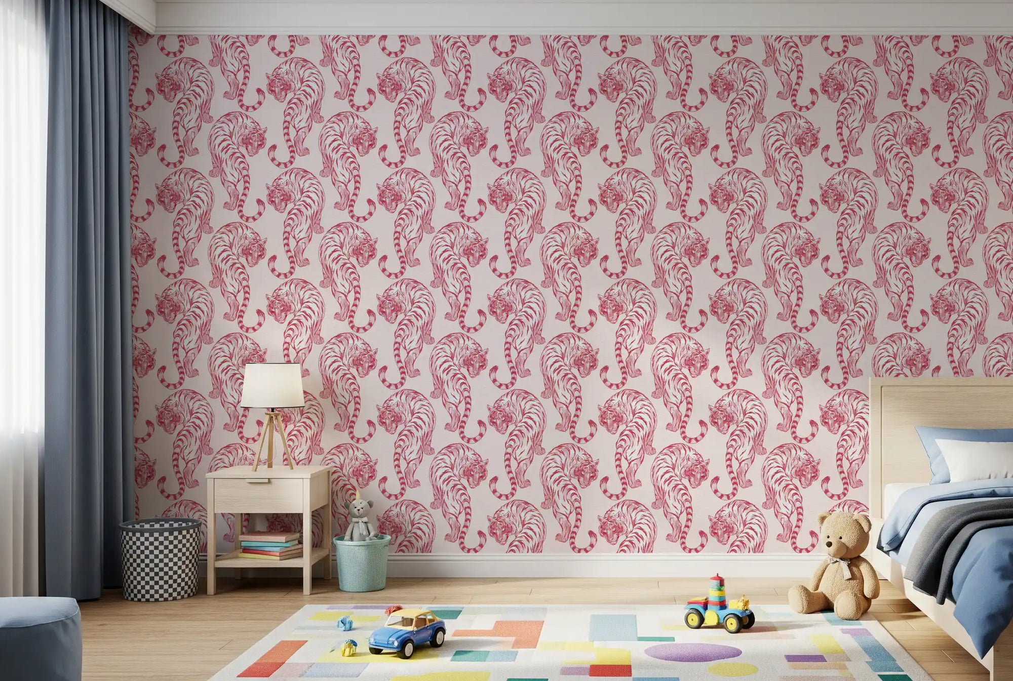 kids bedroom shows crimson chinoiserie tigers on a pale pink ground in this wallpaper.