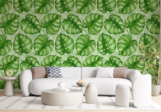 Green monstera leaves in watercolour behind a living room, tropical wallpaper GD10800