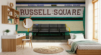 Veggmaleri med London Underground Heritage T-banestasjonsskilt