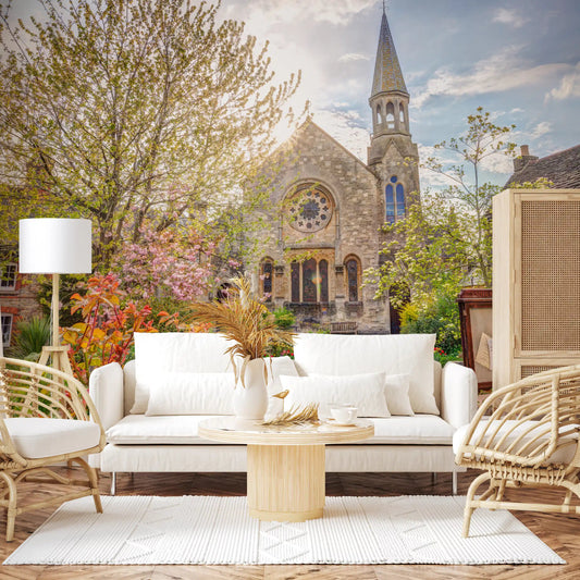 Pink blossom trees fill a church garden wall mural in a Living room GD11180
