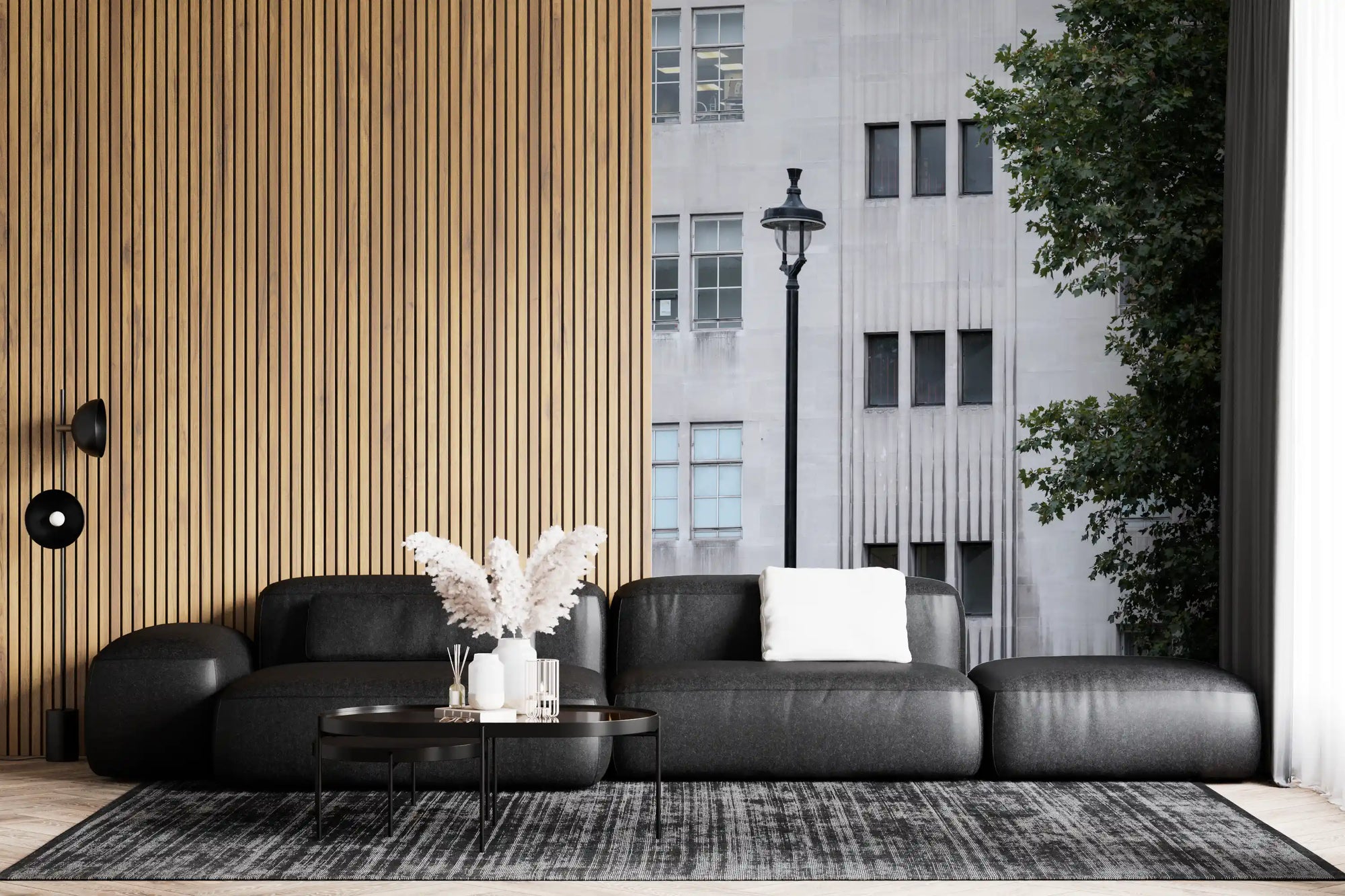 Wall mural with a pale city facade rising over a living room, GD11209