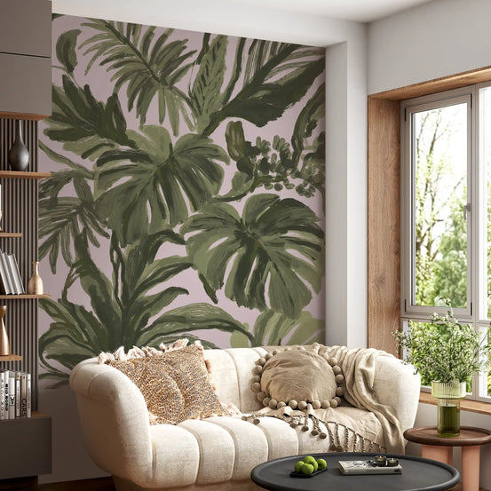 Wall mural across a sunlit living room shows Verdant Brushstroke palm fronds GD11252
