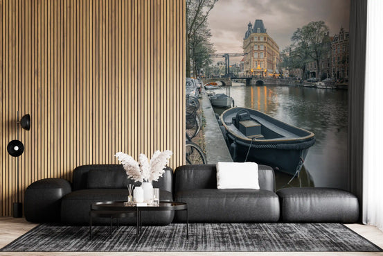 Dutch canal boat glows at evening behind a living room wall mural GD11420