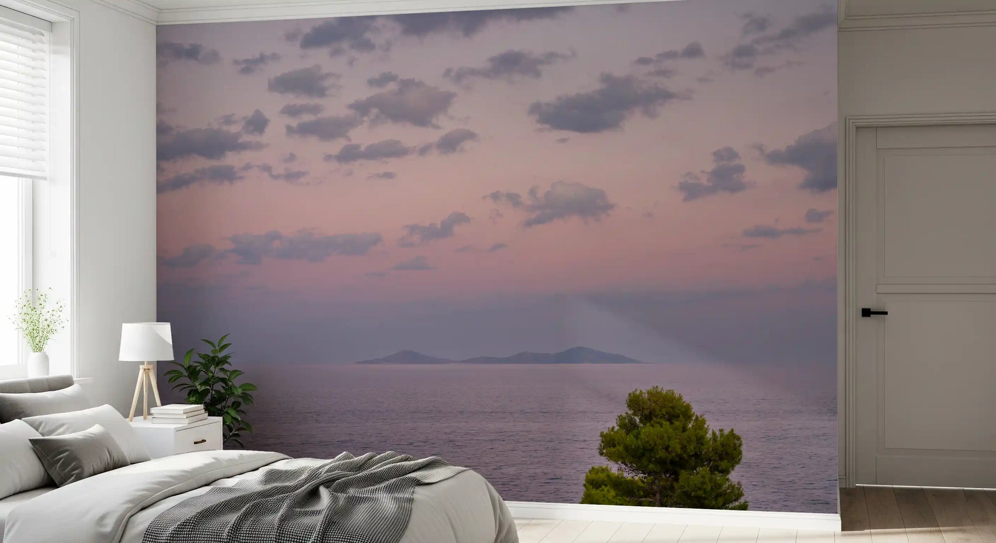Bedroom set with an ethereal island dusk wall mural, pastel ocean scene GD11468