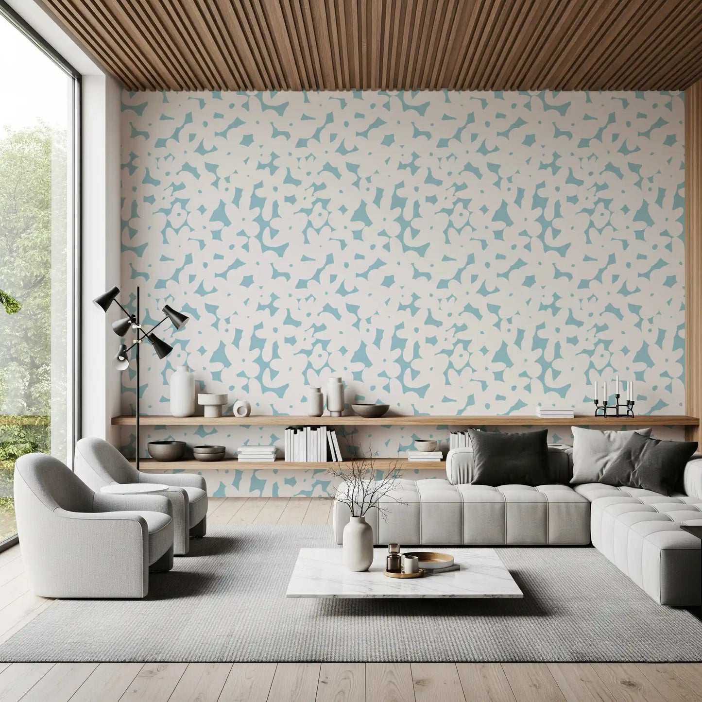 Tapete mit zartblauen floralen Silhouetten
