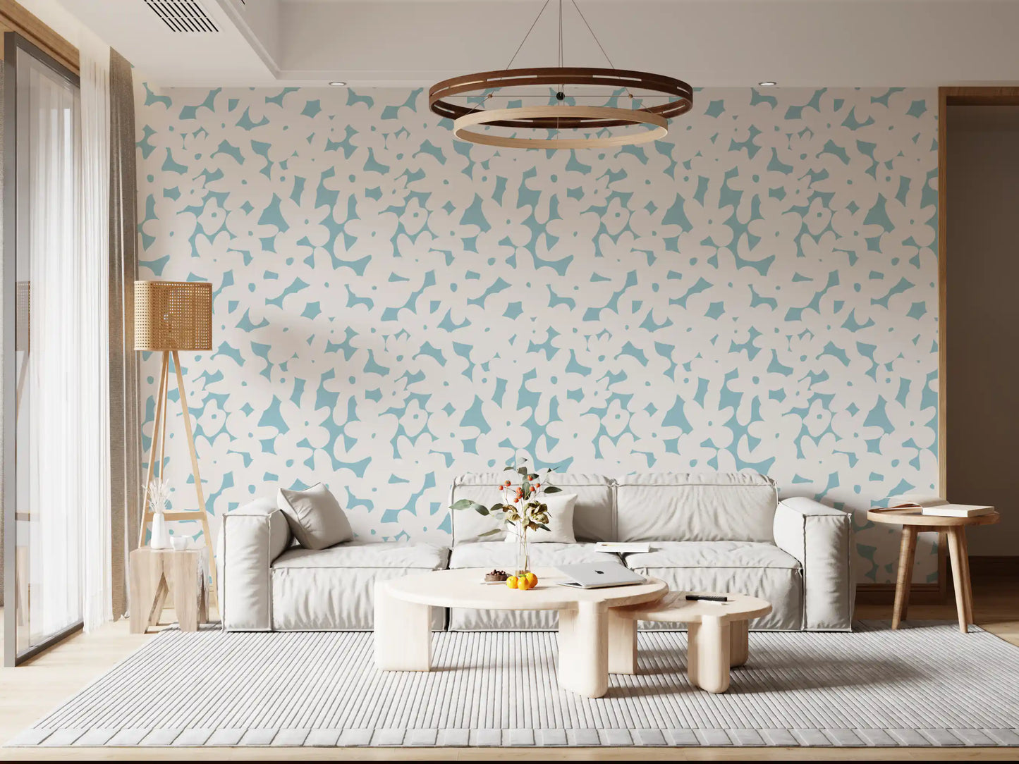 Tapete mit zartblauen floralen Silhouetten