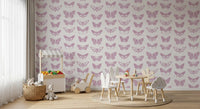 Pink butterfly wallpaper in a kids play area with a bunny table and toy basket GD12294