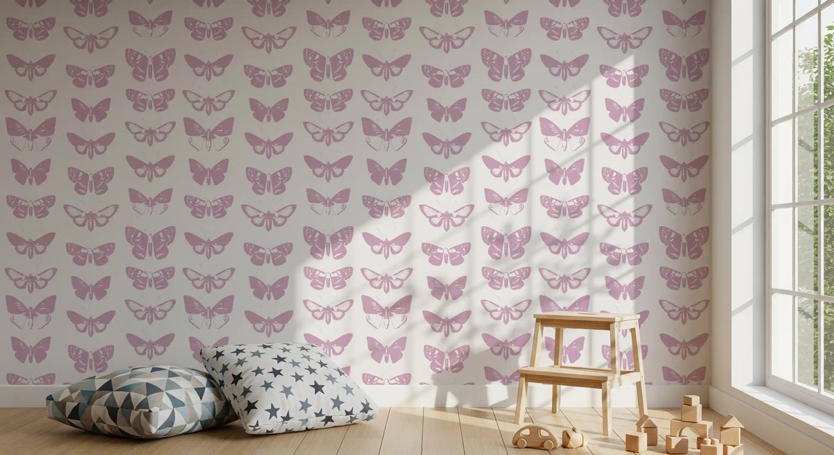 Moth assemblage wallpaper in a play corner with grey star cushions and a step stool GD12294