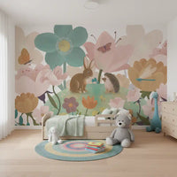 Garden blooms nursery mural behind a low kids bed with a teddy and round rug GD12394