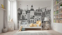Grey illustrated city mural behind a white kids bed with a yellow cushion GD12395