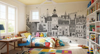 Monochrome city mural in a kids bedroom with a patchwork quilt and bookshelf GD12395