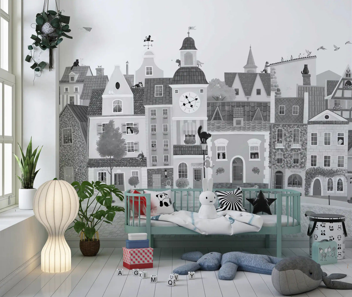 Feline street scene mural in a nursery with a teal cot and a paper balloon lamp GD12395
