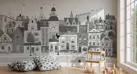 Monochrome town mural in a playroom with star cushions and a wooden step stool GD12395