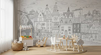 Monochrome city mural in a playroom with white table, cloud chairs and toy storage bins GD12396
