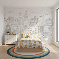 Cat village wall mural above a bed with safari animal bedding and a rainbow oval rug GD12397