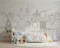 Cat village scene wall mural above a low bed with triangle bedding, a telescope and star rug GD12397