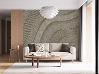 Taupe wavy lines mural behind a cream sofa with round wood coffee table and pendant GD12471