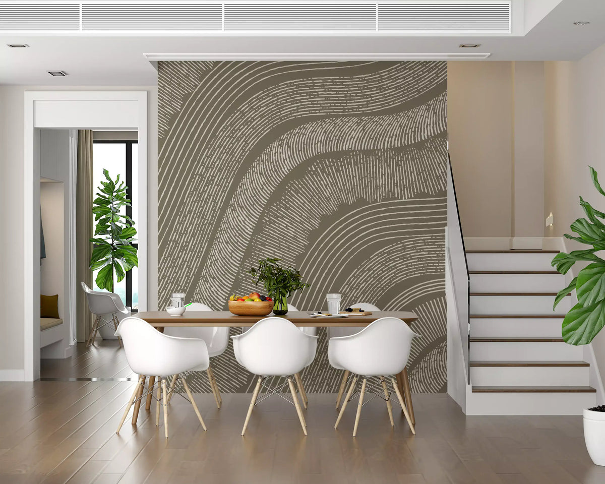 Taupe wavy lines mural behind a white dining set beside a staircase and plant GD12471