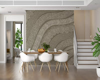 Taupe wavy lines mural behind a white dining set beside a staircase and plant GD12471