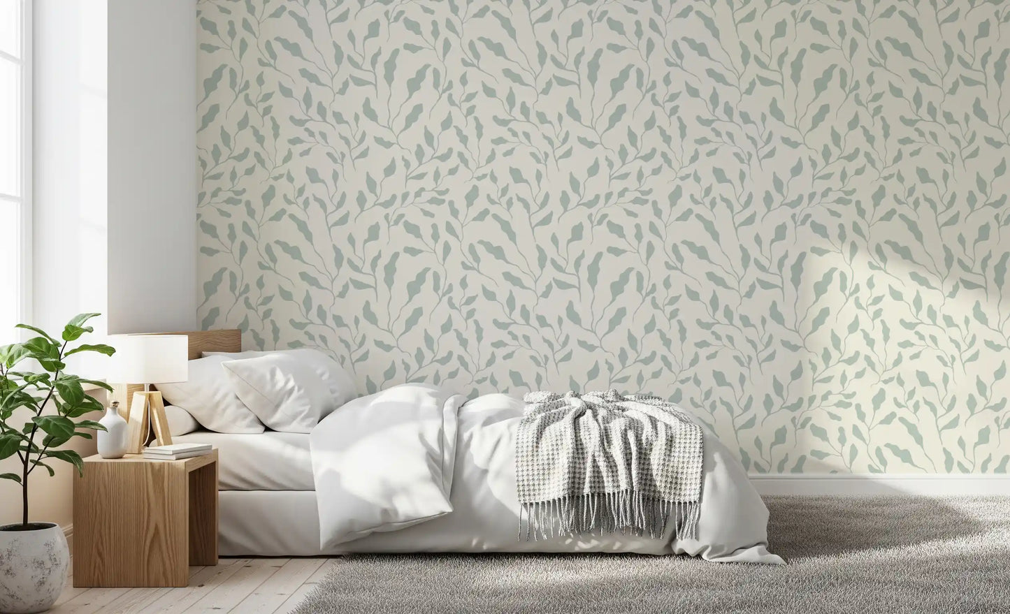 Papel de parede com padrão repetido de folhas em creme e verde-sálvia