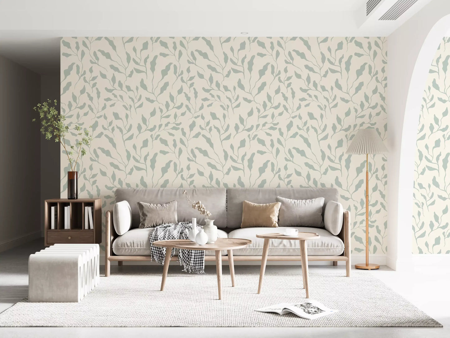 Papel de parede com padrão repetido de folhas em creme e verde-sálvia