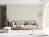 Papel de parede com padrão repetido de folhas em creme e verde-sálvia