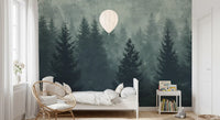 Murale da parete con silhouette di una foresta di pini nella nebbia