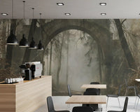 Wandbild „Steinbogen in einem nebligen, uralten Wald“