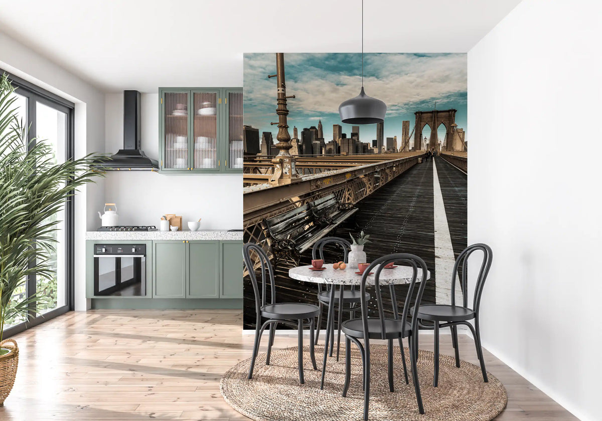 New York wallpaper in a kitchen with a dining table and green cabinets GD13034