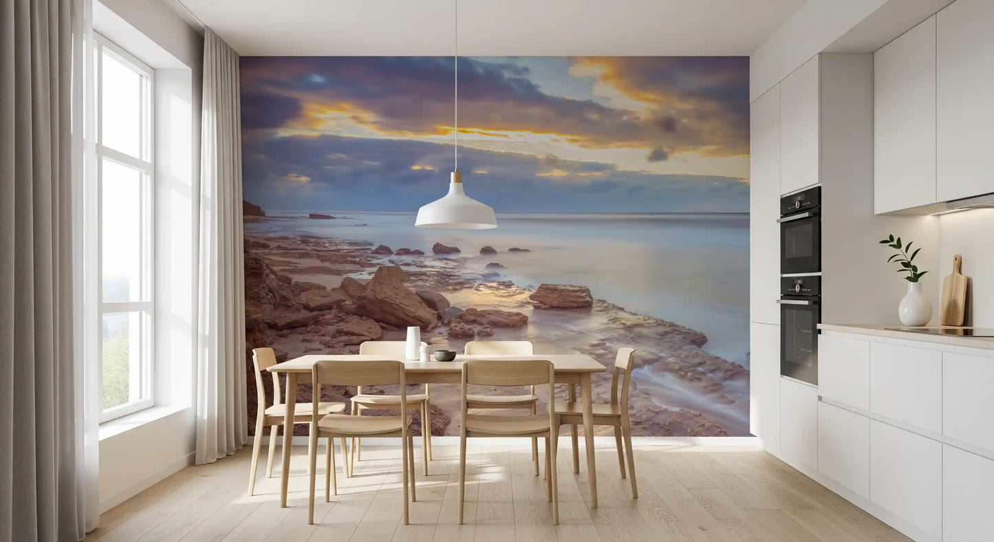 Dämmerungsküste mit Felsen als Wandbild