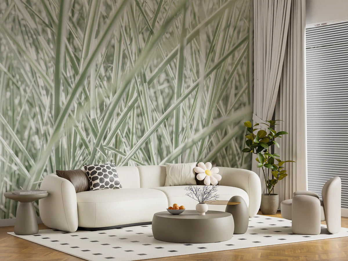 Biophilic wallpaper behind a curved cream sofa and round coffee tables GD13142