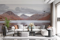 Mountain lake mural behind a white sectional sofa and gray armchair GD13143