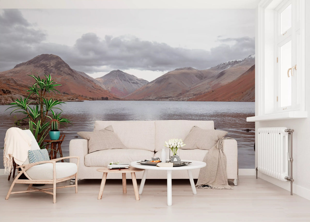 Lake and peaks mural behind a cream sofa and wooden armchair GD13143