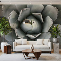 Agave succulent wallpaper behind a white sofa, arc floor lamp and wooden coffee table GD13148