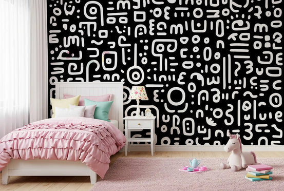 Monochrome geometrische Kritzel-Symbole auf schwarzem Wandbild
