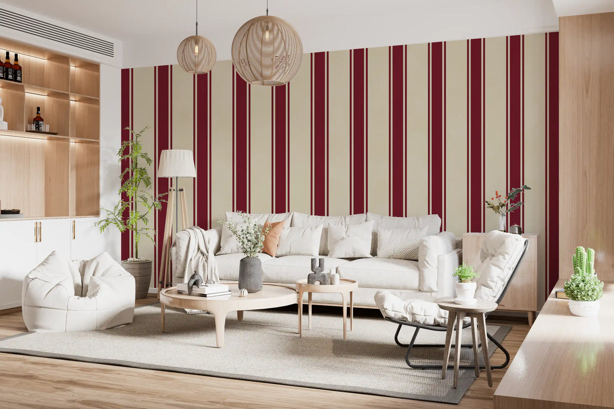 Living room with white sofa, bean bag and round wood table on burgundy striped wallpaper GD13772