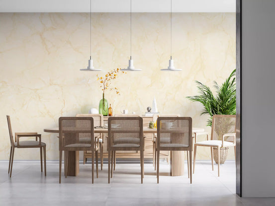 Cream marble wallpaper behind a long wood dining table with cane chairs and pendants GD14010
