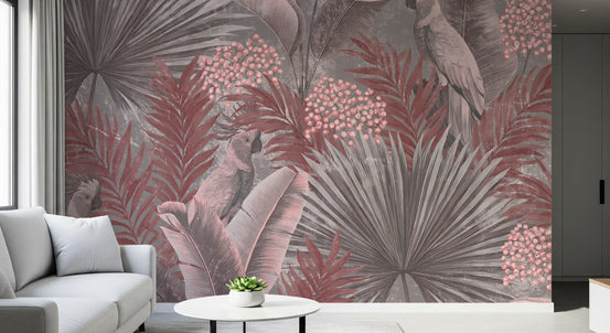 Tropical wallpaper mural with pink cockatoos behind a gray sofa and round white table GD14019