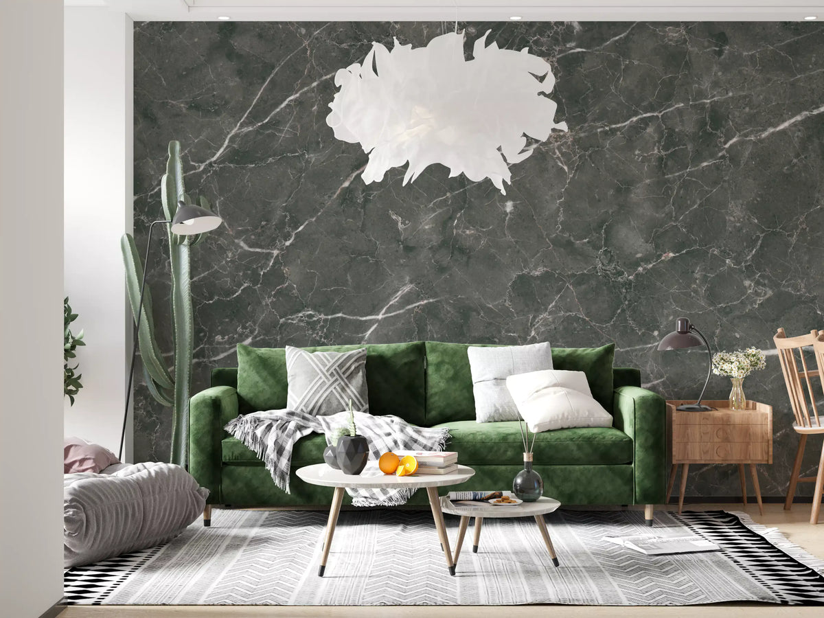 Charcoal marble wallpaper mural behind green velvet sofa and round coffee tables GD14086