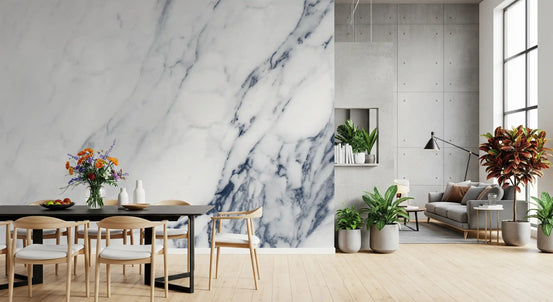 Open plan dining and living space with black table and gray sofa on white marble wallpaper GD14095