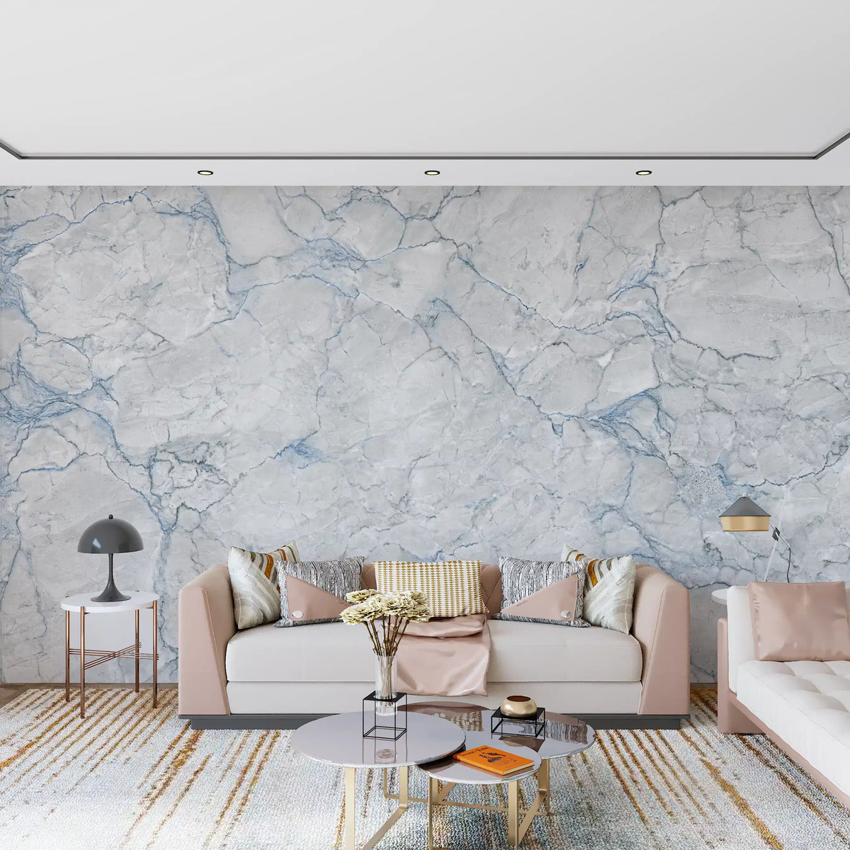 Blush pink sofa and glass coffee tables in front of soft gray marble wallpaper GD14098