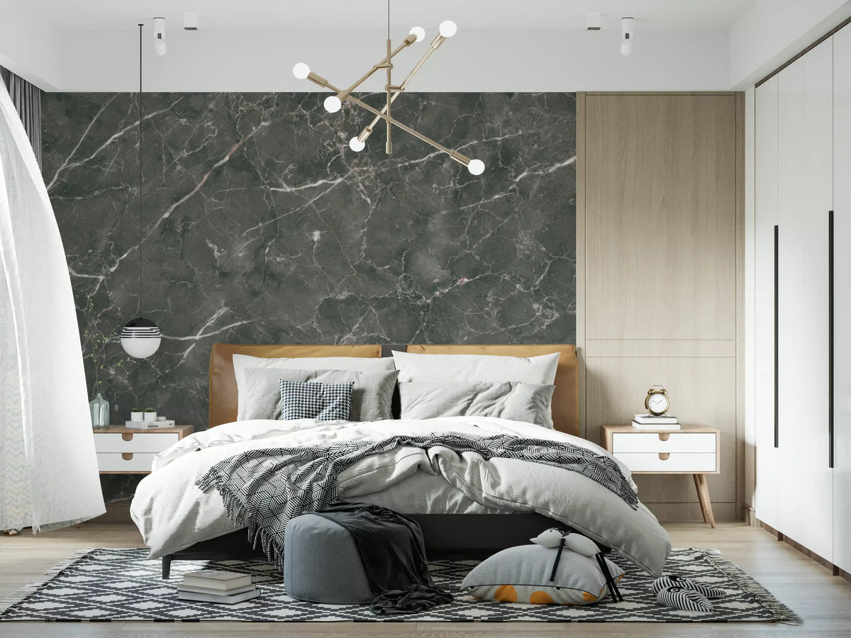 Gray green marble wallpaper behind a white bed under a gold sputnik chandelier GD14105
