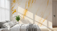 Papier peint panoramique effet veines de marbre doré