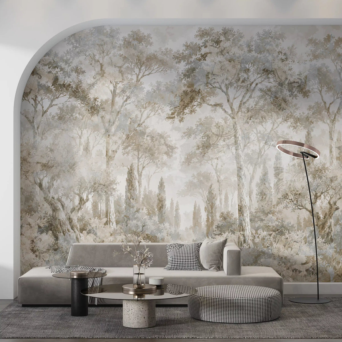 Forest wallpaper in an arched alcove behind a low gray sofa and round tables GD14180
