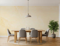 Dining room with gray chairs, wood table and gray pendant on creamy marble wallpaper GD14189