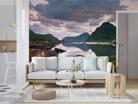 Moody lake mural behind white sofa with mint cushions and round coffee table GD14192