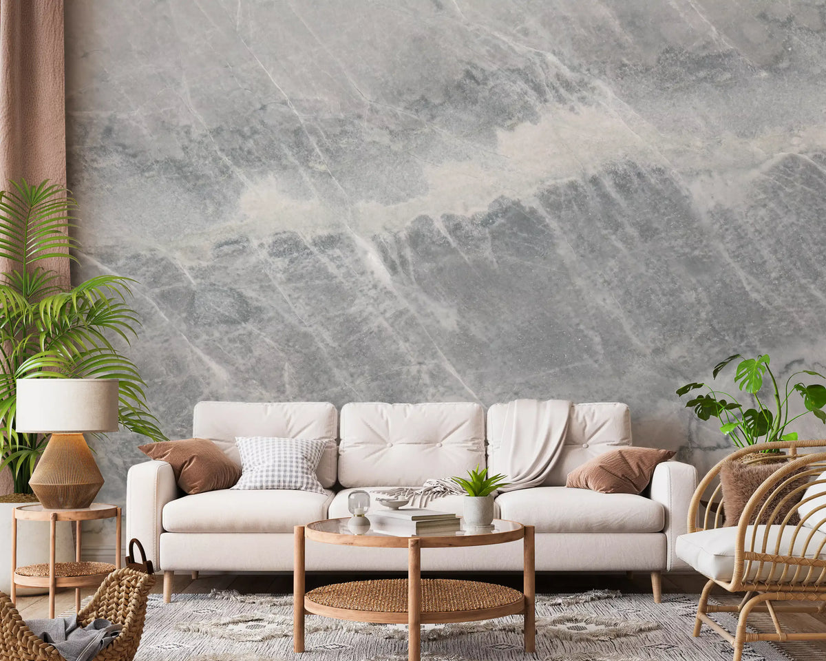 Cream tufted sofa and rattan chair in front of soft gray marble wallpaper GD14203