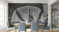 Dining nook with pale blue chairs and white shelves under a Gothic tower arch GD14209