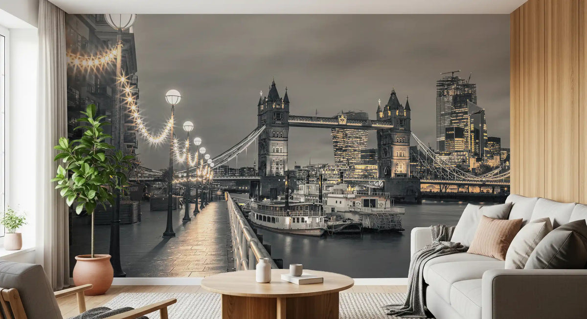 Tower Bridge mural behind a white sofa and round wood coffee table with a tall plant GD14214