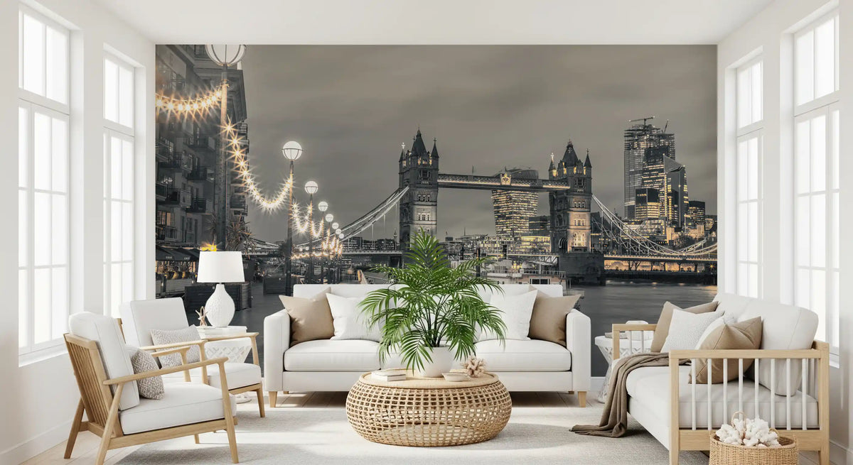 Tower Bridge mural behind a white sofa, wicker table and wooden armchairs GD14214